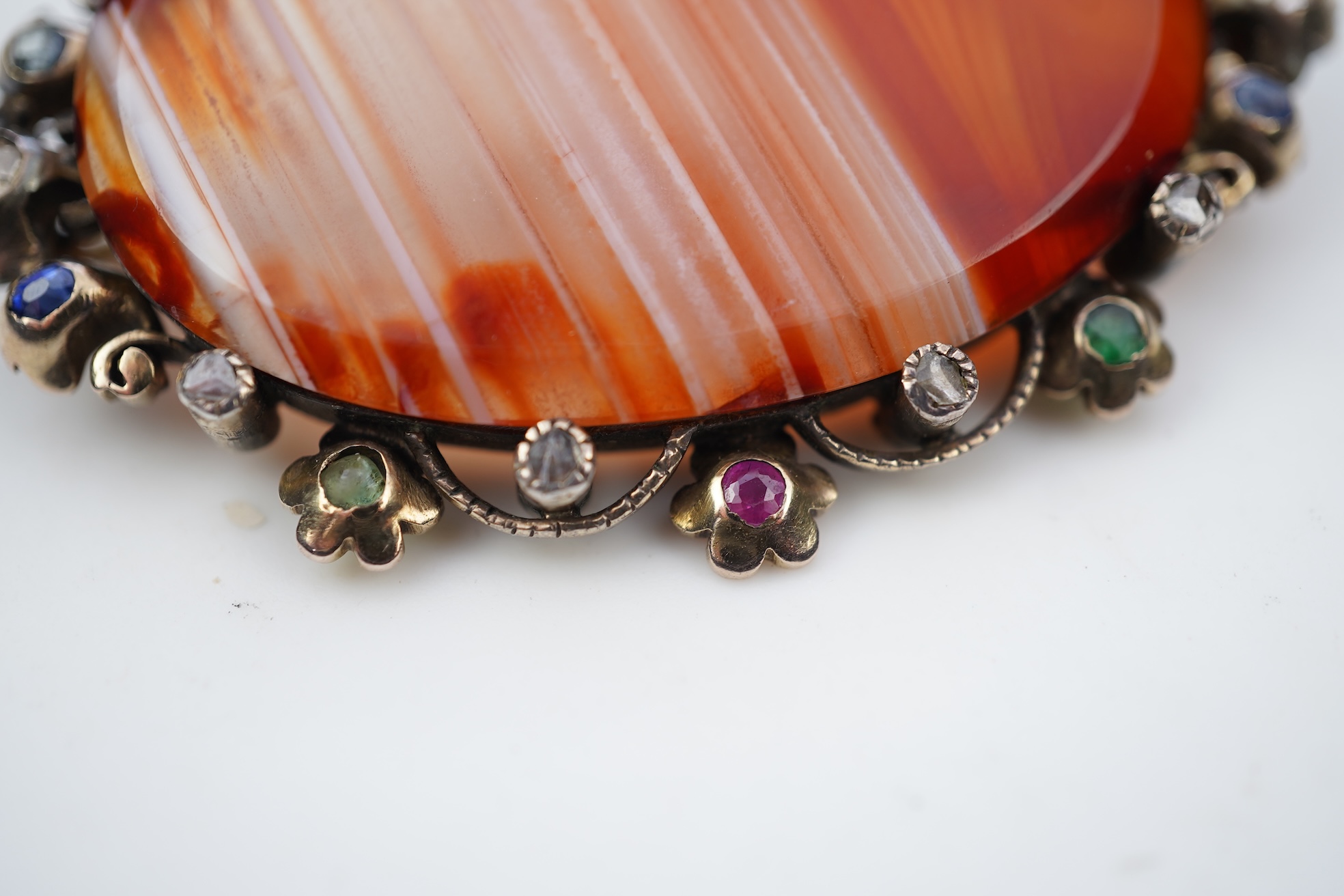 An agate, ruby, emerald and diamond brooch, circa 1900